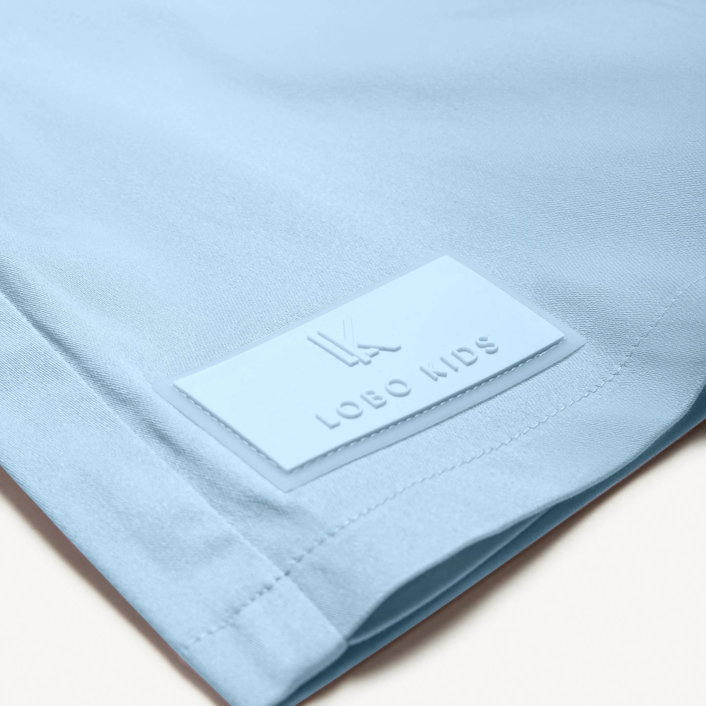 Cotton skort with box pleats and signature patch
